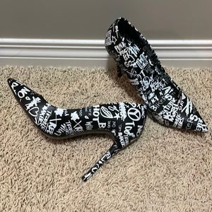 Fun, spunky heels. Black with white detailing. Perfect for adding personality